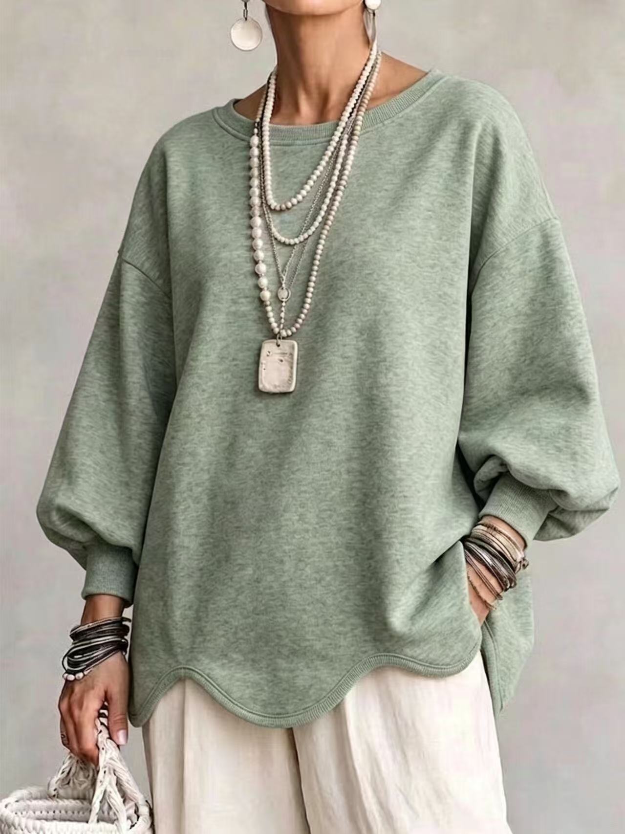 Oversized Sweatshirt With A Wavy Hem
